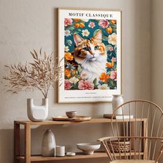 a cat sitting on top of a wooden shelf next to a vase filled with flowers