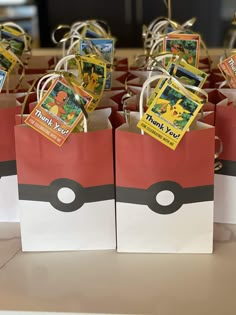 some paper bags with pokemon pictures on them