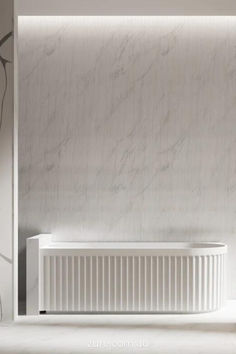 a white radiator sitting in front of a wall