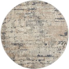 a round rug with an abstract design in beige and grey colors on a white background