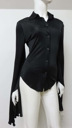 For Sale on 1stDibs - A fabulous black fine stretch silk shirt, top, blouse from Tom Ford for Gucci. It is semi fitted with a shirt collar, black mother of pearl Gucci inscribed Elegant Gucci Blouse For Evening, Elegant Gucci Blouse For Party, Elegant Gucci Party Blouse, Chic Gucci Collared Blouse, Gucci Long Sleeve Evening Tops, Gucci Evening Long Sleeve Tops, Elegant Gucci Office Blouse, Gucci Black Top For Night Out, Elegant Gucci Button-up Shirt