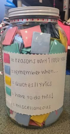 a jar filled with lots of sticky notes