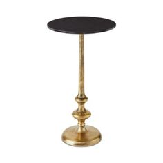 a small black and gold table with a metal base on an isolated white background photo