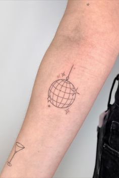 Got an idea for a minimalistic tattoo but need a quality tattoo artist? Look no further. We’ve alredy handpicked the best studios and made it easy and safe to book an appointment. Simply tell us your tattoo idea and we'll help you choose a great tattoo artist. It's easy and free. #tattooinspo #tattoodesign #tattooart #tattooideas #tattooinspiration #tattooartist #tattoos #discoballtattoo #finelinetattoo #funnytattoo #funtattoo Fletcher Tattoo Ideas, Vintage Music Tattoo, Tiny Dancer Tattoo Elton John, Disco Tattoo Ideas, Music Lover Tattoo Ideas, Disco Ball Tattoo Simple, Small Patchwork Tattoo Ideas, Edm Tattoo, Simple Word Tattoos