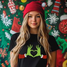 Get into the holiday spirit with our adorable Grinch Heart T-Shirt! Perfect for Christmas gatherings, family photos, or as a playful gift for the Grinch lover in your life. This shirt features a heartwarming design inspired by the beloved Dr. Seuss character, showcasing the Grinch in a fun and festive way. Made from high-quality, breathable fabric, this t-shirt ensures comfort all day long. Available in various sizes, our eco-friendly print makes it a great choice for those looking to celebrate Cute Grinch, Grinch Heart, Grinch Shirts, Heart Tshirt, Christmas Heart, Funny Christmas Tshirts, Christmas Tshirt, Christmas Hearts, Christmas Gathering