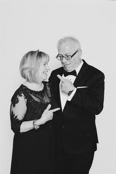 a black and white image of a couple posing in front of a background being silly having a photo taken Black And White Portrait, Melbourne Wedding, White Portrait, Black And White Portraits, Wedding Look, Something Unique, Portrait Photo, Wedding Looks, Black And White Photography