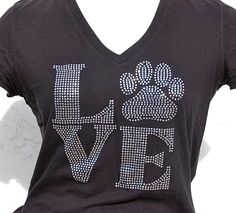 a women's v - neck shirt with the words love and paw prints on it