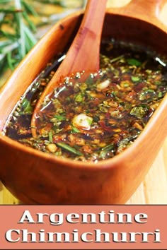 a wooden spoon is in a bowl filled with green chili and other condiments