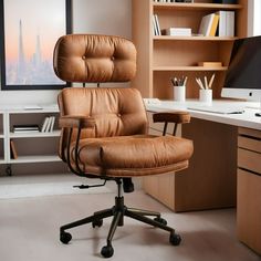 a brown office chair sitting in front of a desk with a computer monitor and bookshelf