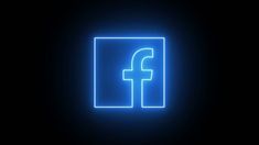 the facebook logo illuminated in blue on a black background with an image of a square