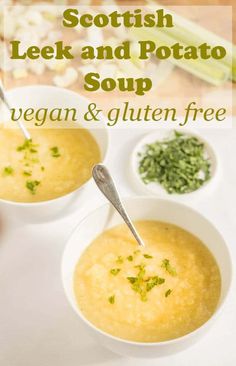 two bowls filled with soup on top of a table