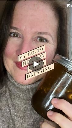 a woman is holding a jar with words on it and the caption says, my go - to holiday is day dressing