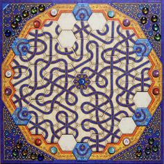 an intricately designed tile with blue and yellow accents