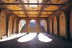 the sun shines through an ornately decorated building