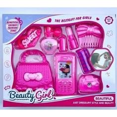 a pink toy set with accessories in it's package, including a hairbrush and comb