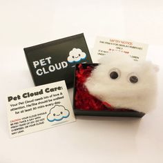 a stuffed animal in a box with its eyes wide open and the label for pet cloud care