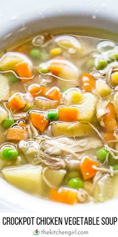 a white bowl filled with chicken vegetable soup