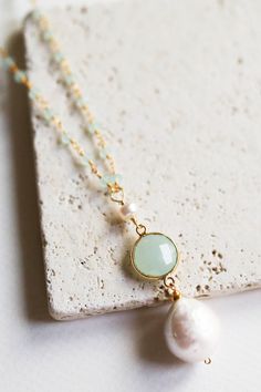 "Free shipping on our long pearl pendant necklaces for women. Beautiful and unique convertible necklace with aqua chalcedony gemstones and a large freshwater baroque pearl. Also available in champagne quartz with a smoky quartz bezel. Choose your option from the listing drop down option. Necklace has a spring ring clasp and can be worn at it's full length of 34\" or can be converted to a double strand 16\" pendant. To convert the chain, just use the spring ring clasp and attach to the larger loo Floating Diamond Necklace, Convertible Necklace, Chalcedony Necklace, Long Pearl Necklaces, Handmade Beaded Necklaces, Necklace Layering, Gemstone Beaded Necklace, Baroque Pearl Necklace, Aqua Chalcedony