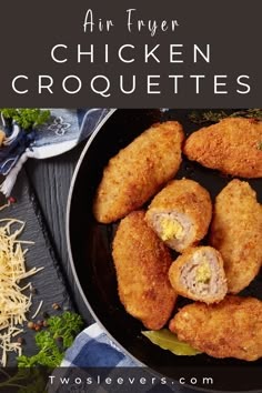 air fryer chicken croquettes in a skillet with shredded parmesan cheese