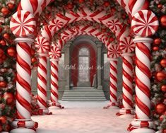 an archway decorated for christmas with candy canes and decorations on the pillars in front of it