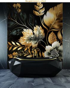 a black and gold bathroom with flowers painted on the wall next to the bathtub