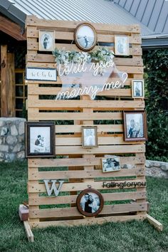 a wooden pallet with pictures on it and the words will you marry me?