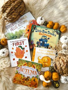 there are many books about autumn on the floor