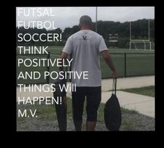 a man walking down a sidewalk with an umbrella and some words above him that read, fusal futbol soccer think positively and positive things will happen