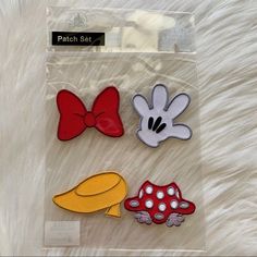 three mickey mouse and minnie mouse patches on a white furnishing background with the words patch set