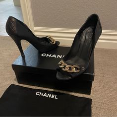 Chanel 100% Authentic! Black Grosgrain & Quilted Leather Open Toe Pumps Gold Tone Chain And Cc Logo. Size 37 1/2 Eu Or 7 1/2 Us. Made In Italy. Light Wear Present, Chanel Logo Missing From The Left Side Of The Pair But Nothing Too Noticeable. Comes With Box And Dustbag. Still Plenty Of Life Left To These! All Condition Is Pictured. Evening Chain Print High Heels, Elegant Party Heels With Chain Print, Leather Heels With Chain Strap For Evening, Leather Heels With Chain Strap For Night Out, Elegant High Heels With Chain Print, Luxury High Heel Chain Detail Heels, Luxury High Heels With Chain Detail, Luxury Chain High Heels, Party Heels With Leather And Chain Details