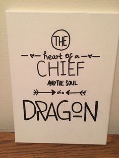 the heart of a chief and the soul of a dragon is written on a canvas