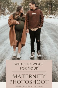 a pregnant couple walking down a snowy road with the text what to wear for your maternity photo shoot