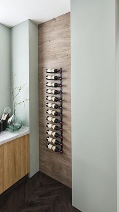 The Helix Single 60 is an innovative 12-bottle wine rack kit that holds standard, Champagne, and magnum bottles on a wall or post as if floating on air. The superior design of VintageView’s wall-mounted wine rack offers maximum strength and efficiency, with elegant curves to add additional visual interest. This wine rack looks almost as good without the bottle. Use a few wine racks to create small wine storage above wet bars, or stack onto taller displays to meet any commercial or residential wine cellar requirement. The Helix Single 60 is part of the R Series by VintageView. Available in Left or Right bottle orientation with three compelling finishes. R Series Modernizing the classic riddling rack wine storage style, the R Series features elegant wine rack options that hold wine bottles b Wine Rack Decor, Small Wine Storage, Riddling Rack, Metal Wine Rack, Elegant Wine, Wall Mounted Wine Rack, Split System, Wet Bars, Wine Storage