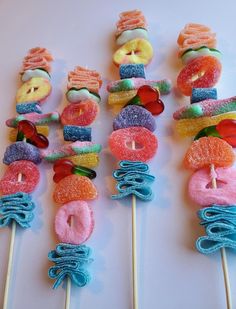 several lollipops are arranged in the shape of doughnuts and donuts