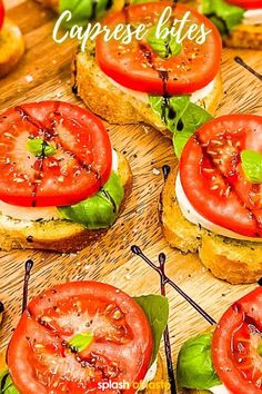 sandwiches with tomatoes and basil on them are arranged on a wooden cutting board, ready to be served