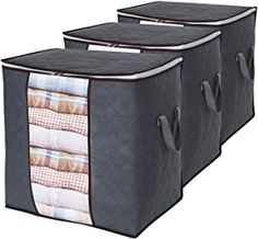 three storage bags with plaid linings on them