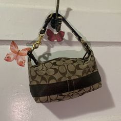 Coach Mini Brown Signature Bag Euc 10” X 4” X 5.5” Strap Is 5” Reposhing This Item I Purchased From @Readysetposh80. Loved It, But Ready To Rotate For Something New. Questions? Leave A Comment Below! Bags Coach, Fancy Bags, Brown Gold, Coach Bags, Something New, Mini Bag, Bag Lady, Size 10, 10 Things