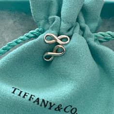 Great Condition Tiffany & Co Dainty Infinity Earrings Does Not Have Backs Comes With Pouch Tiffany Infinity Earrings, Jewelry Tiffany, Infinity Earrings, Tiffany Co Jewelry, Earrings Color, Tiffany & Co., Jewelry Earrings, Pouch, Women Jewelry