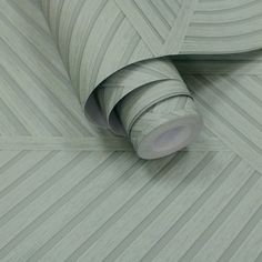 an image of a wallpaper with lines on it's sides and one roll of tape in the middle