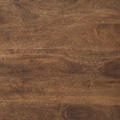 a close up view of the wood grains on this flooring material, which is very dark brown