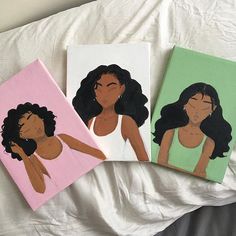 three different colored paintings of women on a white sheet with one woman's face