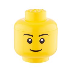 a yellow lego head with eyes and nose is shown in front of a white background