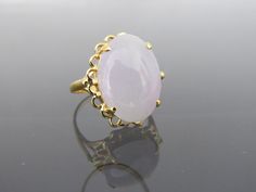 Vintage 18K Solid Yellow Gold Translucent Oval Natural Light Lavender Jadeite Jade Ring....Marked 18k ...Total of weights 4.9grams...Size 7.25..Measure of Jade 18 x 13MMIt's in very good condition. #461958 Formal Oval Kunzite Rings, Formal Pink Oval Opal Ring, Vintage Bangle Bracelets, Light Lavender, Buddha Pendant, Jade Ring, Filigree Ring, Perfect Ring, Ring Size 7