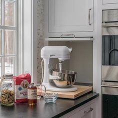 the kitchen counter is clean and ready to be used as a blender or mixer