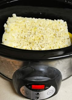 the rice is cooked in the slow cooker and ready to be put into the crock pot