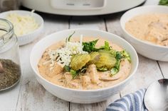 two bowls filled with food next to an instant pressure cooker