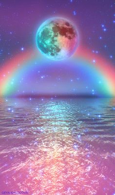 an image of a rainbow moon over the ocean