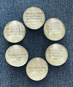 six glass buttons with words on them that say, speak to make yourself happy and happiness is the light of life