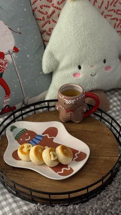 a tray with some cookies on it and a teddy bear