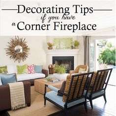 a living room filled with furniture and a fire place under a sunburst mounted on the wall